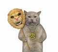 Cat holds lion carnival mask 2