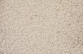 Beige cement plaster wall as background or texture.