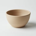 Beige ceramic bowl with a smooth texture and matte finish. The bowl is round with Royalty Free Stock Photo