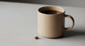 A beige ceramic mug filled with Royalty Free Stock Photo