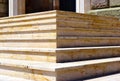 beige color exterior stone stairs. abstract closeup view of corner. riser, nosing and treads