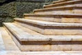 beige color exterior stone stairs. abstract closeup view of corner. riser, nosing and treads