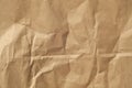 Beige color paper sheet surface with wrinckles. Royalty Free Stock Photo