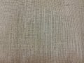 Beige coloured seamless linen texture or fabric canvas for your background.