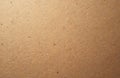 Beige cork texture, natural material with a rough, speckled surface and visible grain. Offers ample copy space for design. Royalty Free Stock Photo