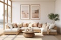 Beige corner sofa in the living room, coffee table and a set of posters on the white wall. Large windows and daylight. Modern Royalty Free Stock Photo