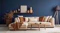 Beige corner sofa in room with dark blue walls. Interior design of modern living room Royalty Free Stock Photo