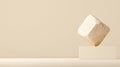 A beige cube sculpture with a rough texture is suspended in mid-air by a white rectangular base. Royalty Free Stock Photo