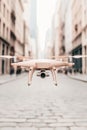 Beige device flies above cobblestone street. Buildings rise blurry in background. Machine learning applications with device Royalty Free Stock Photo
