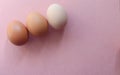 Eggs pink background pastel