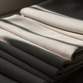 Beige fabric with a textured surface, possibly linen or cotton, is arranged Royalty Free Stock Photo