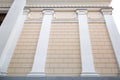 The beige facade of a historical building. Royalty Free Stock Photo