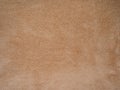 beige faux suede closeup - textile background