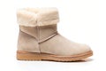 Beige female shammy boot isolated on white Royalty Free Stock Photo