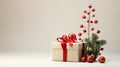 Beige Gift Box With Red And Green Ornaments And Foliage Royalty Free Stock Photo