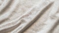 Beige gold velvet background or velour flannel texture made of cotton or wool with soft fluffy velvety satin fabric cloth metallic