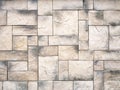 The beige-gray rectangular tiles are laid out in different directions and create an attractive vibrant backdrop Royalty Free Stock Photo