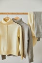 Beige and grey knitted soft sweaters