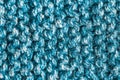 Beige Knitted Background. Blue cyan knitting wool, Netting, Knitwork. Copy space. Hobby concept