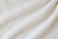 Beige knitted woolen background. Knitwear fabric texture. Royalty Free Stock Photo