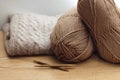 Beige knitting yarn. Handmade knitted products. Hobby, needlework concept