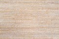 Beige light peach carpet texture background. Polypropylene carpet, close-up, top view, texture, braided rough pad beige