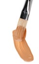 Beige liquid foundation makeup stroke with brush Royalty Free Stock Photo