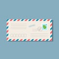 Beige long envelope with colour stripes and stamp Royalty Free Stock Photo