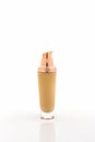 Beige make up foundation in luxurious bottle.