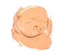 Beige makeup smear of creamy foundation on white background. Light beige creamy foundation. Isolated