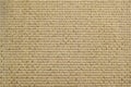 Beige natural linen fabric with brilliance golden lurex close-up Royalty Free Stock Photo