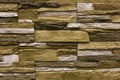 Beige natural stone facade, wall tiles texture Royalty Free Stock Photo