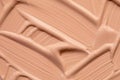 Beige nude liquid foundation texture, concealer smear smudge drop. Closeup macro. Cosmetic tonal makeup moisturizer, bb cream