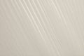 Beige paper and cellophane texture wave background