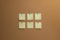 Beige paper notes pinned to cork board Royalty Free Stock Photo