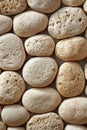 Beige Pebble Background, Texture of Round Smooth Stones, Top View for Spa, Zen, Minimalistic Design