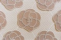 Beige porcelan stoneware tile with floral pattern. Background of porcelain stonewear tiles