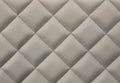 Beige quilted fabric background Royalty Free Stock Photo