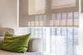 Beige roller blind on large window Royalty Free Stock Photo