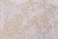 Beige rough wall textured background. Abstact stucco. Texture of plaster on the wall.