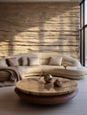 Beige round sofa near wavy sandstone wall. Interior design of modern living room
