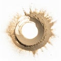 Beige Sand Explosion Forming a Circle on White Background Royalty Free Stock Photo