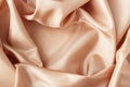 Beige satin material with beautiful pleats.