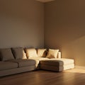 A beige sectional sofa with multiple cushions is positioned in the corner of a room. Royalty Free Stock Photo