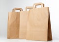 Beige shopping bags.