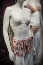 beige shorty and white bra on mannequin in a fashion store showroom for women Royalty Free Stock Photo