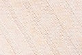 Beige soft knitted fabric texture with strips wale. Royalty Free Stock Photo