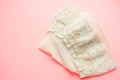 Beige stockings with elastic lace on the pink table Royalty Free Stock Photo