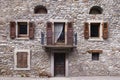 Beige stone wall with many windows Royalty Free Stock Photo