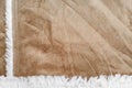 Beige suede texture with artificial soft fur. closeup shammy background Royalty Free Stock Photo